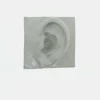 Left Ear - White