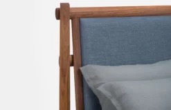 Twenty-Five Upholstered Bed