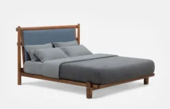 Twenty-Five Upholstered Bed